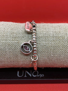 Uno De 50 15 MC Silver Plate "My Luck" Elastic Bracelet with Pink Crystal Eye Charm