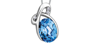 10K White Gold Oval Blue Topaz and & Diamond Pendant with 18" Chain