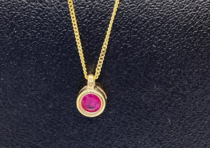 10K Yellow Gold Bezel Set Ruby Pendant with 16-18" Chain